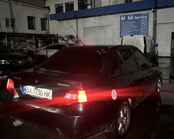 Чорний Деу Нексія, об'ємом двигуна 1.6 л та пробігом 201 тис. км за 1599 $, фото 3 на Automoto.ua