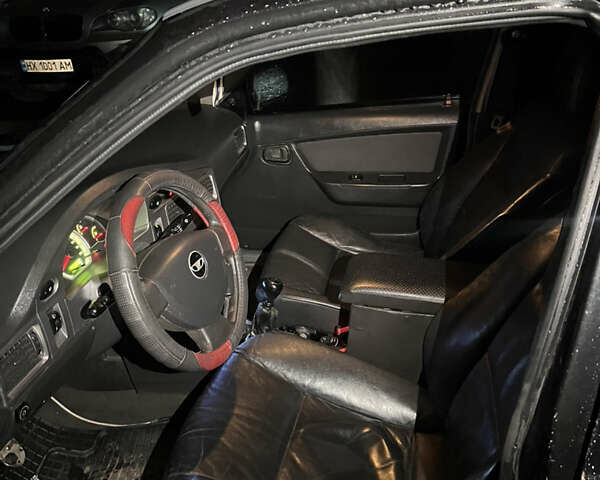 Чорний Деу Нексія, об'ємом двигуна 1.6 л та пробігом 201 тис. км за 1799 $, фото 5 на Automoto.ua