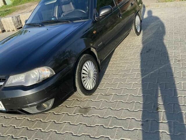 Чорний Деу Нексія, об'ємом двигуна 1.6 л та пробігом 220 тис. км за 2195 $, фото 4 на Automoto.ua