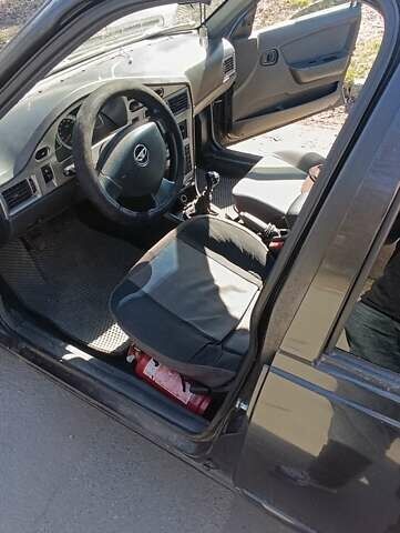 Чорний Деу Нексія, об'ємом двигуна 1.5 л та пробігом 168 тис. км за 2400 $, фото 6 на Automoto.ua