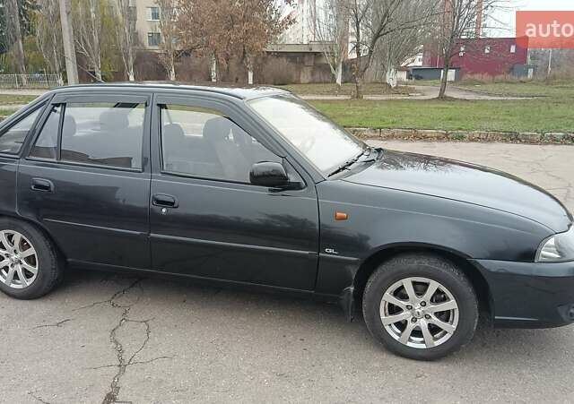 Черный Дэу Нексия, объемом двигателя 1.5 л и пробегом 66 тыс. км за 3500 $, фото 1 на Automoto.ua