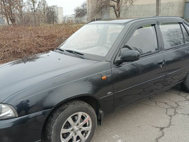 Черный Дэу Нексия, объемом двигателя 1 л и пробегом 66 тыс. км за 3500 $, фото 4 на Automoto.ua