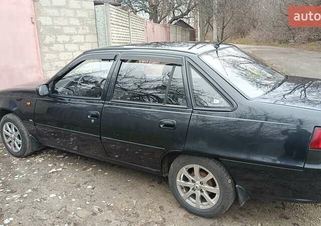 Черный Дэу Нексия, объемом двигателя 1.5 л и пробегом 66 тыс. км за 3500 $, фото 4 на Automoto.ua