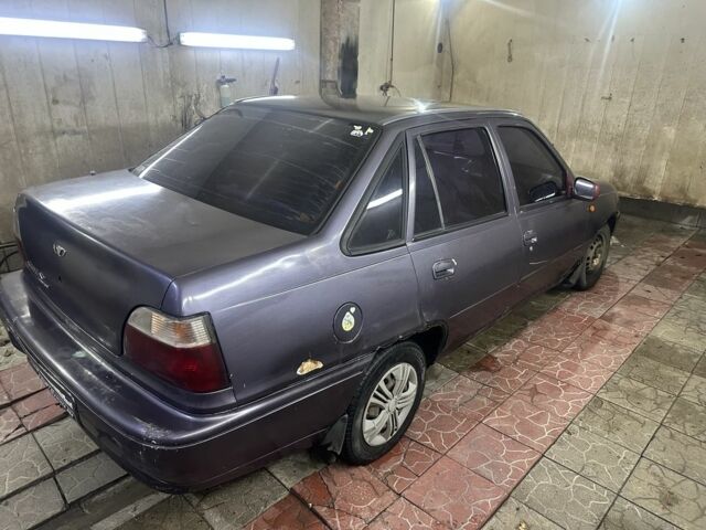 Фиолетовый Дэу Нексия, объемом двигателя 1.5 л и пробегом 100 тыс. км за 700 $, фото 3 на Automoto.ua