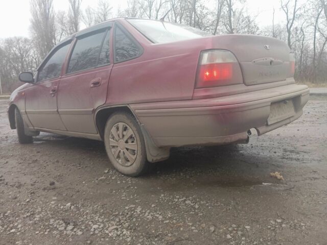 Червоний Деу Нексія, об'ємом двигуна 1.5 л та пробігом 233 тис. км за 1750 $, фото 1 на Automoto.ua