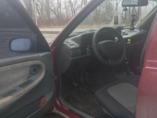 Червоний Деу Нексія, об'ємом двигуна 1.5 л та пробігом 233 тис. км за 1750 $, фото 6 на Automoto.ua