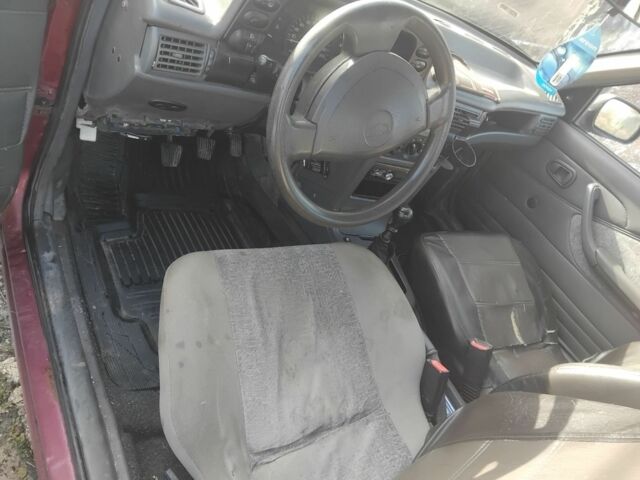 Червоний Деу Нексія, об'ємом двигуна 1.3 л та пробігом 250 тис. км за 832 $, фото 5 на Automoto.ua