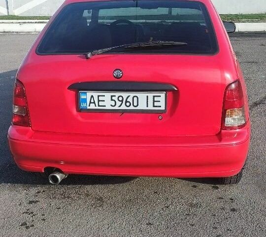 Червоний Деу Нексія, об'ємом двигуна 1.5 л та пробігом 300 тис. км за 1400 $, фото 1 на Automoto.ua