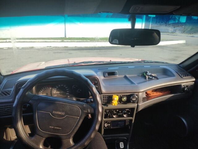 Червоний Деу Нексія, об'ємом двигуна 1.5 л та пробігом 300 тис. км за 1400 $, фото 3 на Automoto.ua