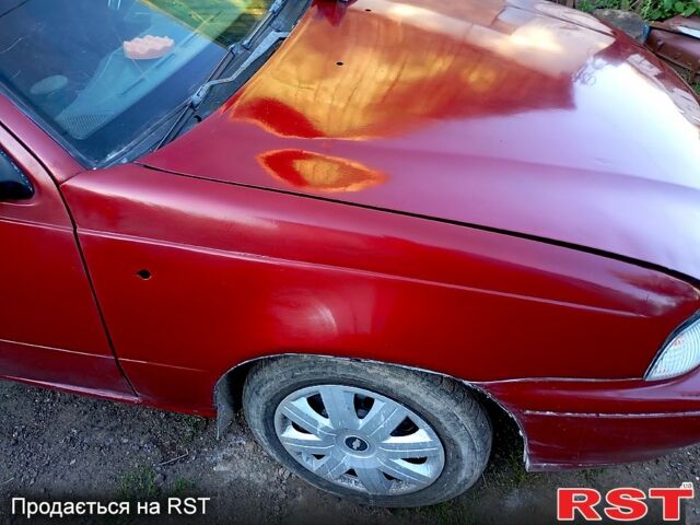 Червоний Деу Нексія, об'ємом двигуна 1.5 л та пробігом 302 тис. км за 1000 $, фото 6 на Automoto.ua