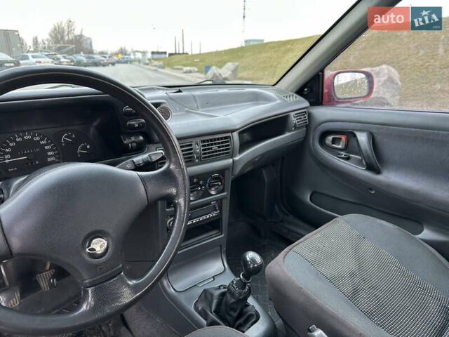 Красный Дэу Нексия, объемом двигателя 1.5 л и пробегом 270 тыс. км за 1999 $, фото 13 на Automoto.ua