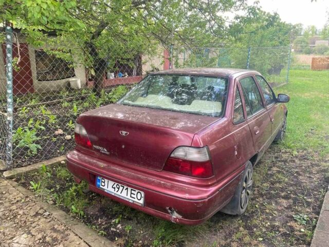 Красный Дэу Нексия, объемом двигателя 1.6 л и пробегом 255 тыс. км за 900 $, фото 1 на Automoto.ua