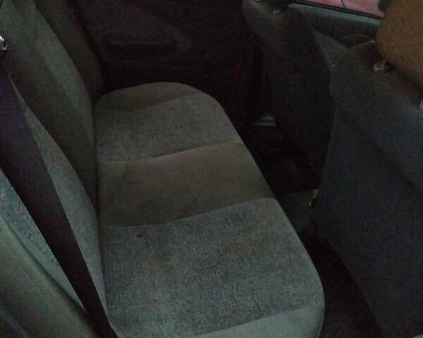 Червоний Деу Нексія, об'ємом двигуна 1.5 л та пробігом 140 тис. км за 555 $, фото 6 на Automoto.ua