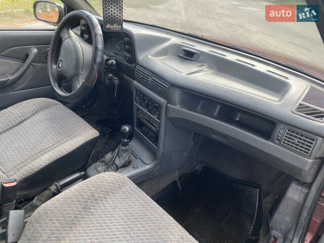 Червоний Деу Нексія, об'ємом двигуна 1.5 л та пробігом 250 тис. км за 850 $, фото 6 на Automoto.ua