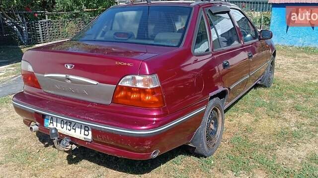 Деу Нексія 2005 у Бородянке на Automoto.ua Червоний Деу Нексія, об'ємом двигуна 1.5 л та пробігом 332 тис. км за 1500 $, фото 3 на Automoto.ua
