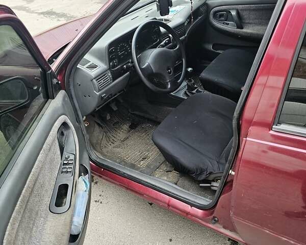 Красный Дэу Нексия, объемом двигателя 1.5 л и пробегом 293 тыс. км за 1999 $, фото 7 на Automoto.ua