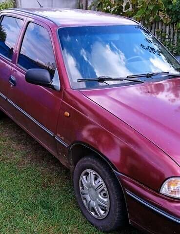 Червоний Деу Нексія, об'ємом двигуна 1.5 л та пробігом 230 тис. км за 1550 $, фото 6 на Automoto.ua