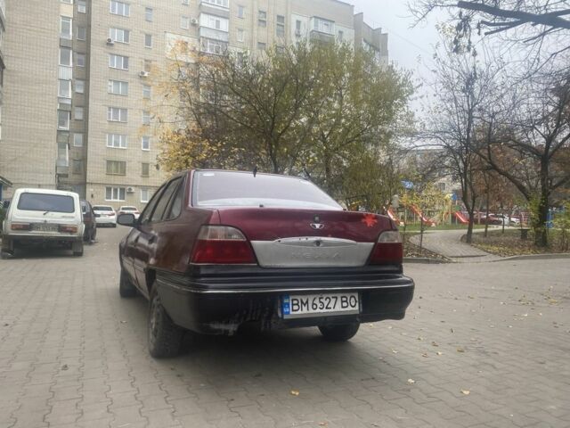 Червоний Деу Нексія, об'ємом двигуна 1.5 л та пробігом 200 тис. км за 715 $, фото 5 на Automoto.ua