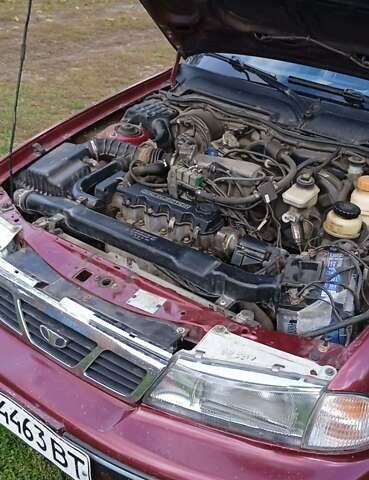 Червоний Деу Нексія, об'ємом двигуна 1.5 л та пробігом 230 тис. км за 1550 $, фото 13 на Automoto.ua