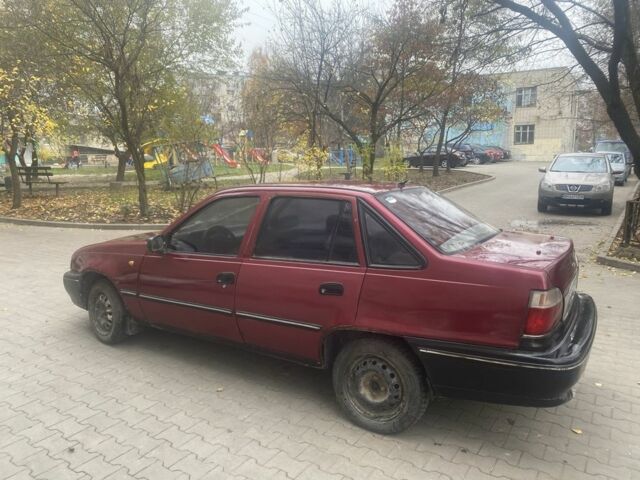 Червоний Деу Нексія, об'ємом двигуна 1.5 л та пробігом 200 тис. км за 715 $, фото 7 на Automoto.ua