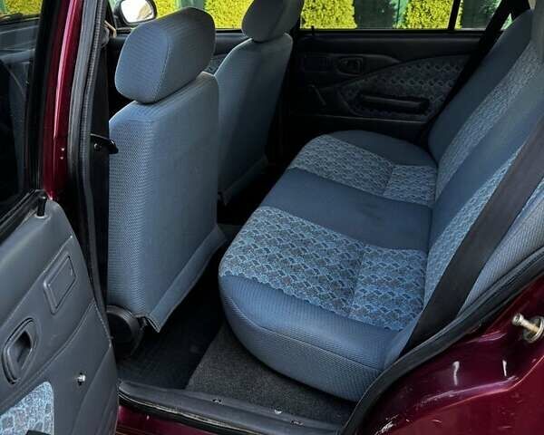 Красный Дэу Нексия, объемом двигателя 1.5 л и пробегом 170 тыс. км за 2139 $, фото 3 на Automoto.ua