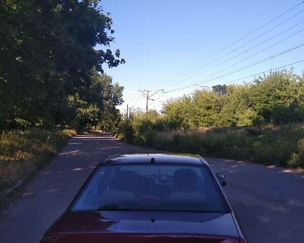 Червоний Деу Нексія, об'ємом двигуна 1.5 л та пробігом 293 тис. км за 2000 $, фото 2 на Automoto.ua