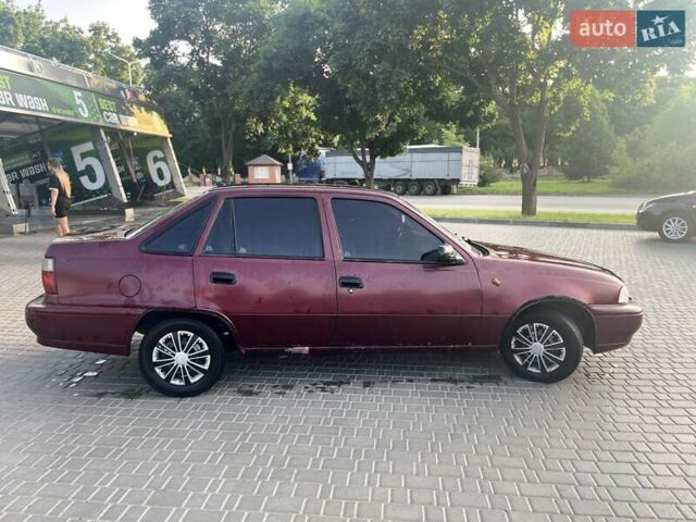 Красный Дэу Нексия, объемом двигателя 1.5 л и пробегом 300 тыс. км за 1350 $, фото 1 на Automoto.ua