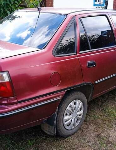 Червоний Деу Нексія, об'ємом двигуна 1.5 л та пробігом 230 тис. км за 1550 $, фото 8 на Automoto.ua