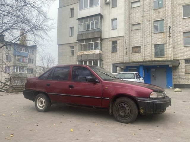 Червоний Деу Нексія, об'ємом двигуна 1.5 л та пробігом 200 тис. км за 715 $, фото 2 на Automoto.ua