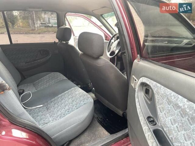 Червоний Деу Нексія, об'ємом двигуна 1.5 л та пробігом 171 тис. км за 1400 $, фото 7 на Automoto.ua