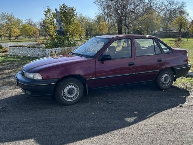 Червоний Деу Нексія, об'ємом двигуна 1.5 л та пробігом 179 тис. км за 999 $, фото 6 на Automoto.ua