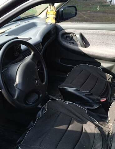 Червоний Деу Нексія, об'ємом двигуна 1.5 л та пробігом 230 тис. км за 1350 $, фото 3 на Automoto.ua