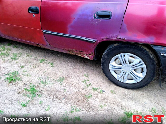 Червоний Деу Нексія, об'ємом двигуна 1.5 л та пробігом 200 тис. км за 699 $, фото 11 на Automoto.ua