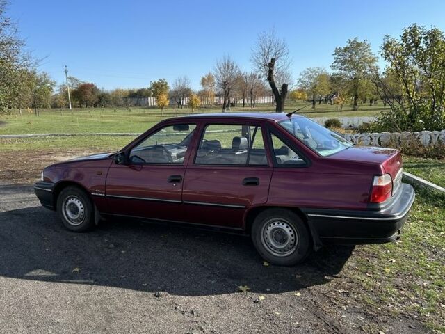 Червоний Деу Нексія, об'ємом двигуна 1.5 л та пробігом 179 тис. км за 999 $, фото 7 на Automoto.ua