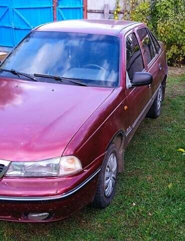 Червоний Деу Нексія, об'ємом двигуна 1.5 л та пробігом 230 тис. км за 1350 $, фото 10 на Automoto.ua