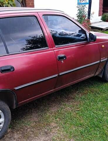 Червоний Деу Нексія, об'ємом двигуна 1.5 л та пробігом 230 тис. км за 1350 $, фото 9 на Automoto.ua