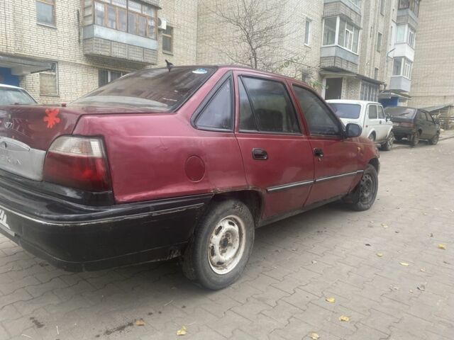 Червоний Деу Нексія, об'ємом двигуна 1.5 л та пробігом 200 тис. км за 715 $, фото 4 на Automoto.ua