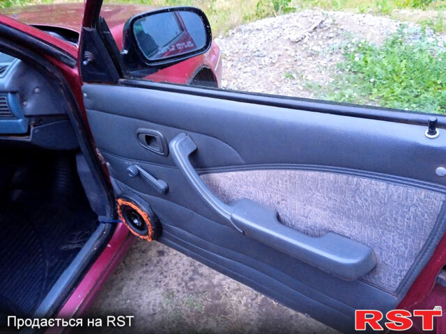 Червоний Деу Нексія, об'ємом двигуна 1.5 л та пробігом 200 тис. км за 699 $, фото 9 на Automoto.ua