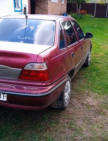 Червоний Деу Нексія, об'ємом двигуна 1.5 л та пробігом 230 тис. км за 1550 $, фото 12 на Automoto.ua