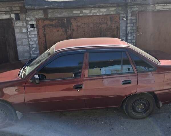 Красный Дэу Нексия, объемом двигателя 1.5 л и пробегом 157 тыс. км за 2100 $, фото 1 на Automoto.ua