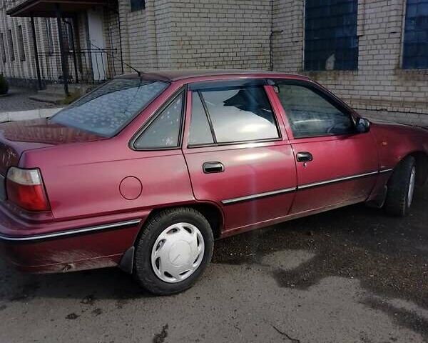 Красный Дэу Нексия, объемом двигателя 1.5 л и пробегом 200 тыс. км за 2000 $, фото 3 на Automoto.ua