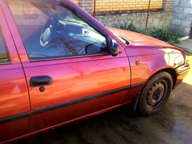 Красный Дэу Нексия, объемом двигателя 1.5 л и пробегом 150 тыс. км за 1300 $, фото 2 на Automoto.ua