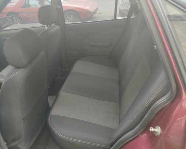 Червоний Деу Нексія, об'ємом двигуна 1.5 л та пробігом 141 тис. км за 1800 $, фото 6 на Automoto.ua