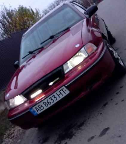 Червоний Деу Нексія, об'ємом двигуна 1.5 л та пробігом 88 тис. км за 1350 $, фото 7 на Automoto.ua