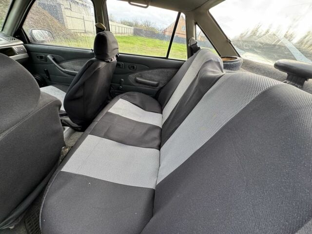 Червоний Деу Нексія, об'ємом двигуна 1.5 л та пробігом 250 тис. км за 750 $, фото 6 на Automoto.ua