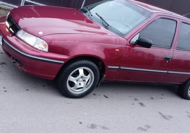 Червоний Деу Нексія, об'ємом двигуна 1.5 л та пробігом 270 тис. км за 1350 $, фото 1 на Automoto.ua