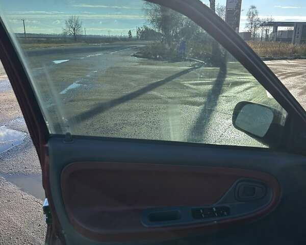 Красный Дэу Нексия, объемом двигателя 1.5 л и пробегом 262 тыс. км за 2800 $, фото 10 на Automoto.ua