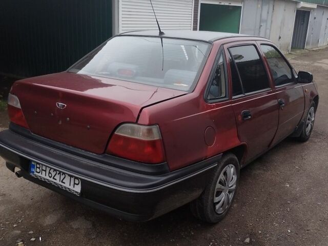 Красный Дэу Нексия, объемом двигателя 1.5 л и пробегом 200 тыс. км за 850 $, фото 3 на Automoto.ua
