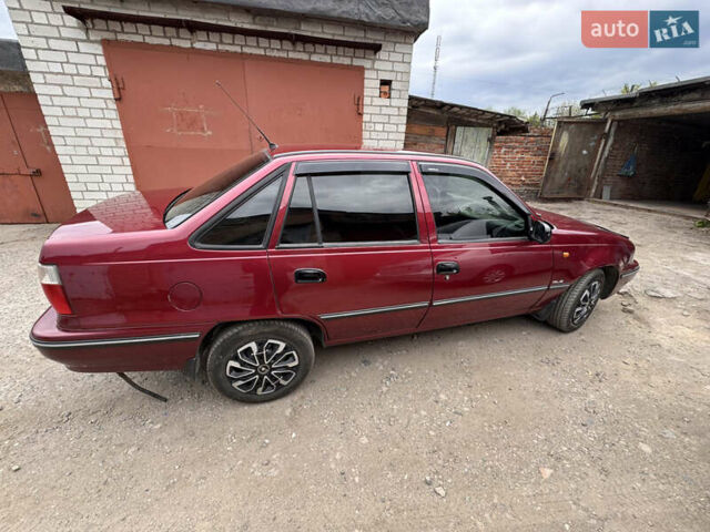 Червоний Деу Нексія, об'ємом двигуна 1.5 л та пробігом 195 тис. км за 2999 $, фото 35 на Automoto.ua