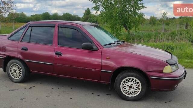 Красный Дэу Нексия, объемом двигателя 1.5 л и пробегом 356 тыс. км за 1200 $, фото 1 на Automoto.ua